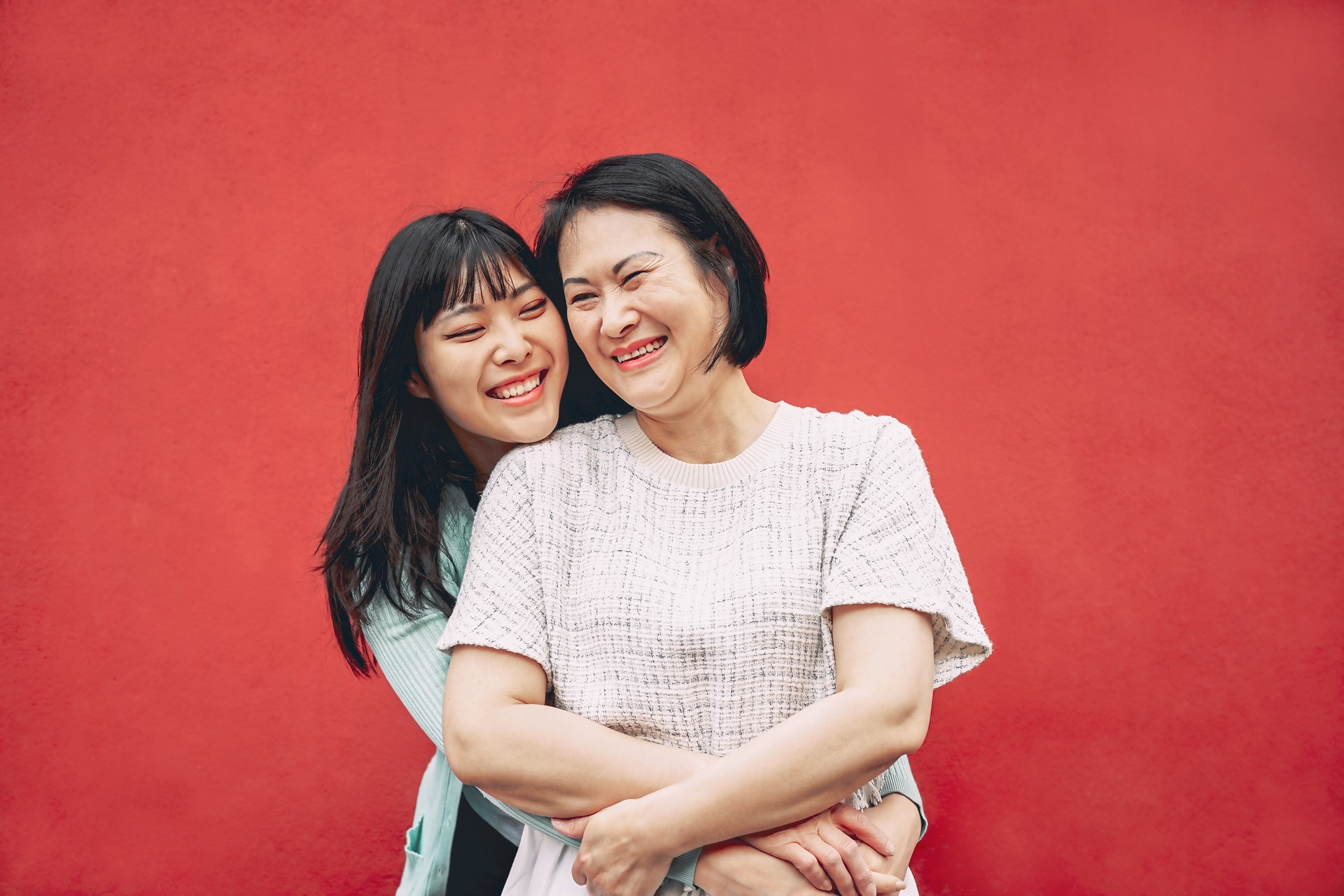 Image of Happy Asian mother and daughter having fun outdoor - Chinese family people spending time together outside - Love, relationship and Parenthood lifestyle concept